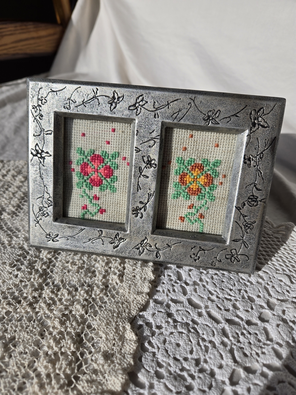 Hand Crafted Silver Floral Double Frame with Pink and Orange Cross-Stitch